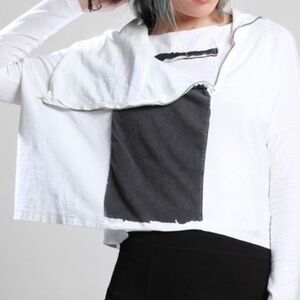 Special designer top. Never worn. Lightweight statement piece. Unique!